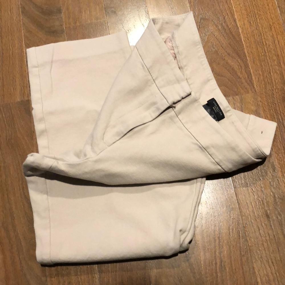 Palest pink ankle pants.